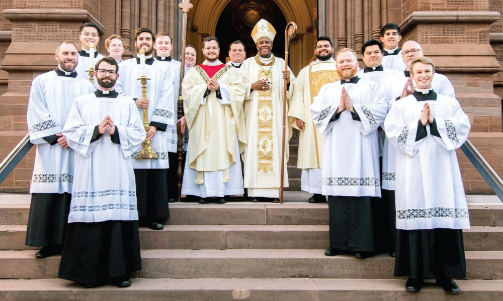 Bishop Jacques Fabre-Jeune with newly ordained