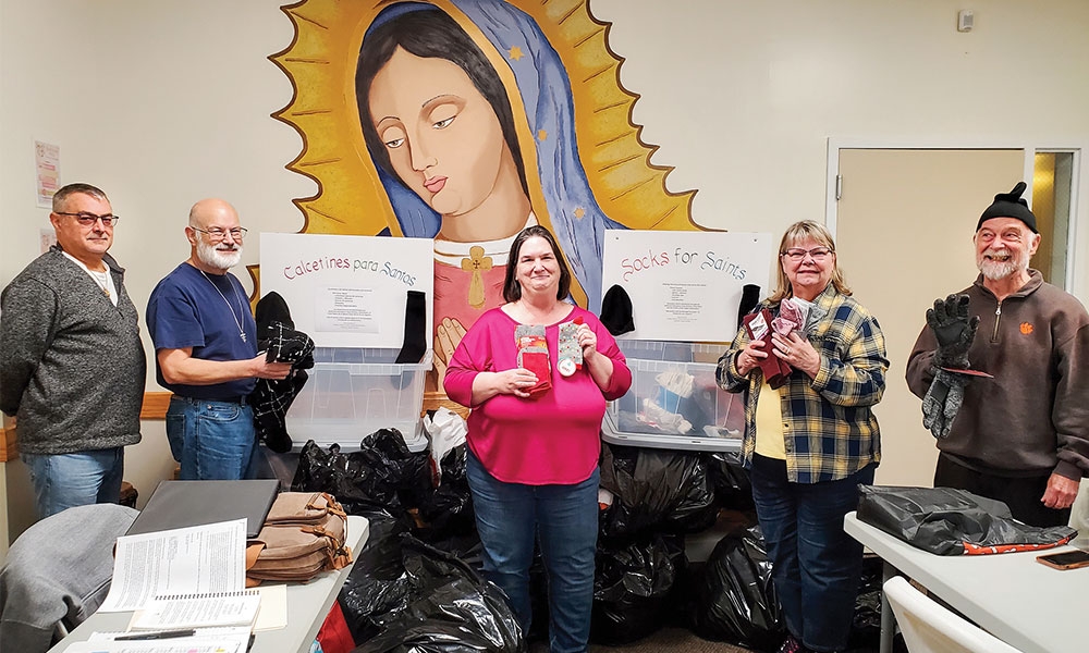 From left to right are Deacon Sal Cancello, Charlie Comberrel, Nanette Perron, Sharral Jensen (candidate), and former spiritual assistant Franciscan Father Bob Menard