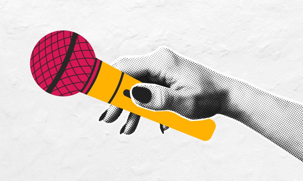 Black and white dot image of a hand holding an illustrated yellow and red colored microphone