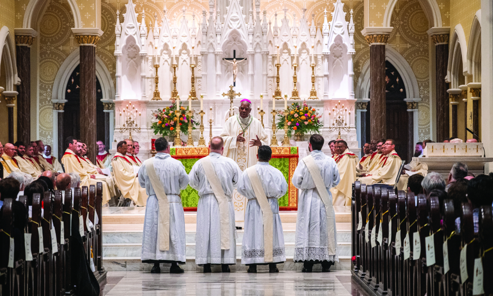 Bishop speaking to the newly ordained