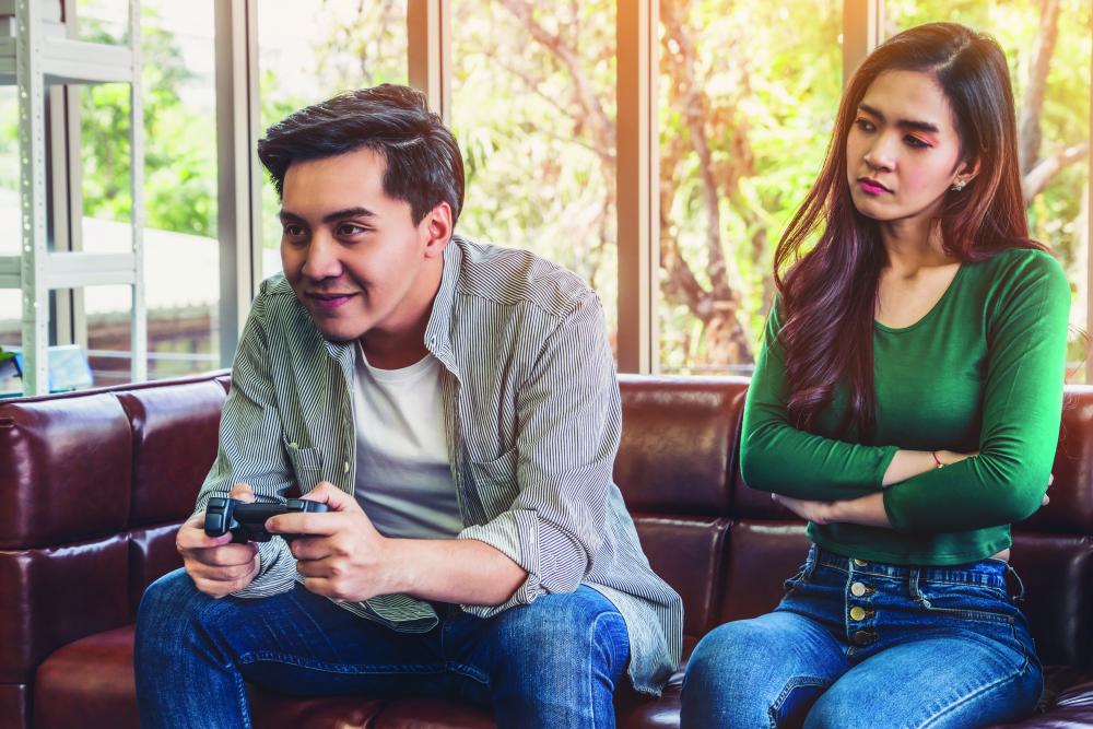 She says: I thought he would stop playing video games after we got married