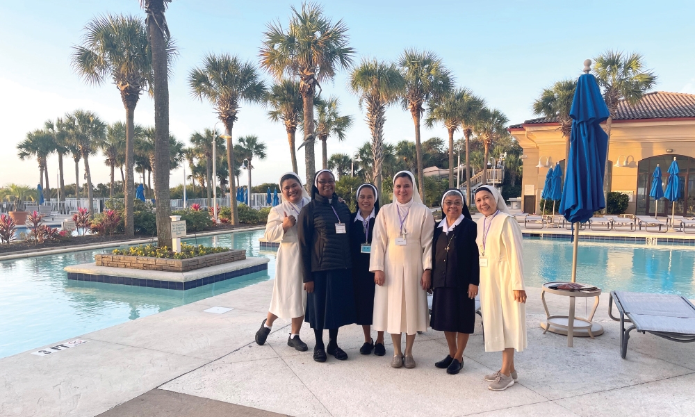 A group of sisters posing for a photo at the annual CMI conference