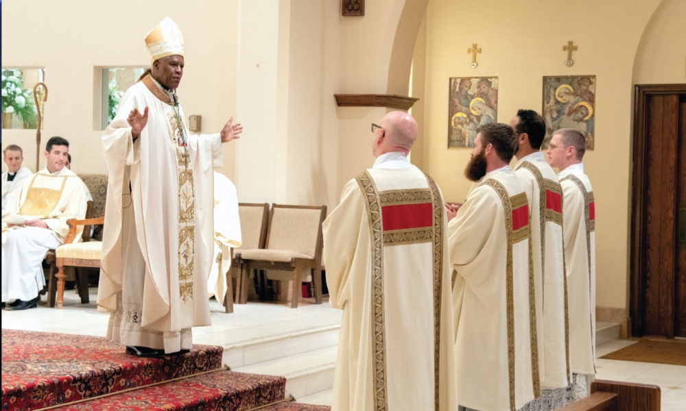 Bishop Fabre-Jeune blesses the newly ordained